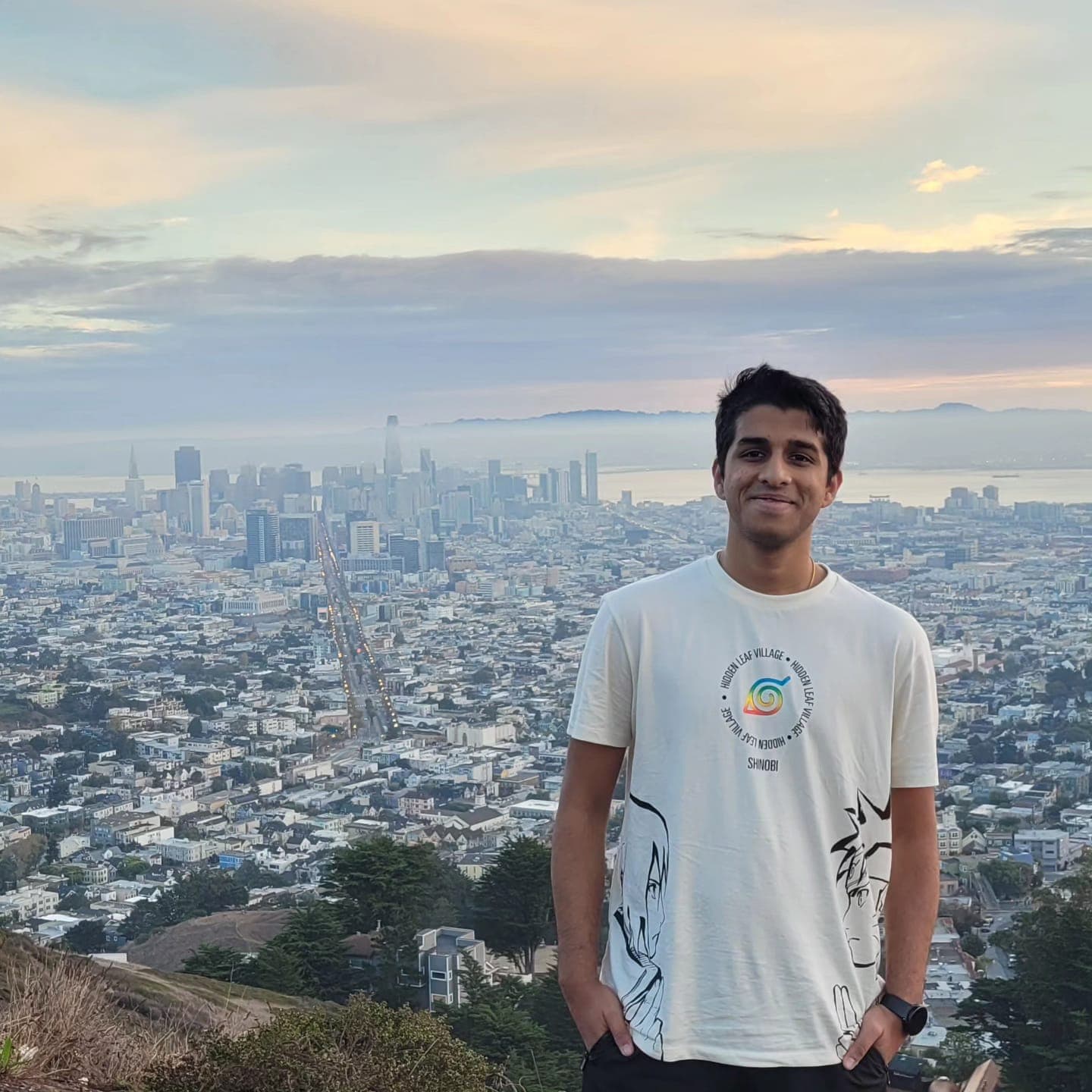 Aniruddhan at Twin Peaks overlooking the San Francisco skyline at dusk